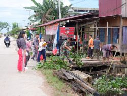 Tanggapan Camat Sangatta Utara dalam kegiatan jumat bersih di Jl. Poros Dayung